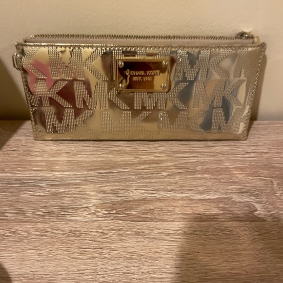 Michael Kors gold metallic MK print wristlet. - Picture 3 of 5